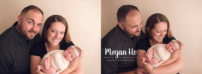 proud nh parents with their newborn baby girl in studio session