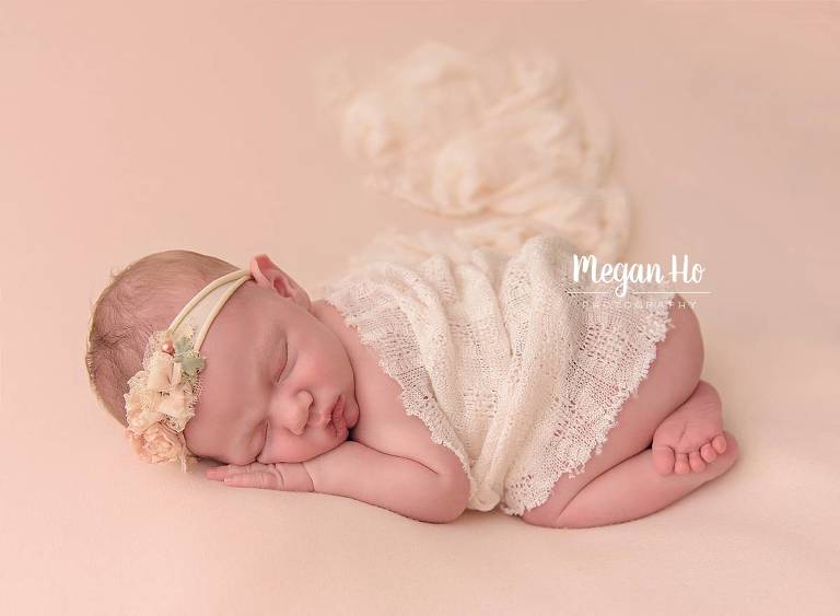 bedford nh newborn session baby girl in bum up pose with lace and flower headband