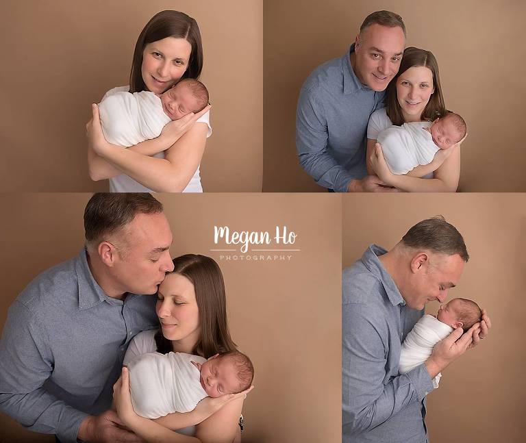 new family of three happily snuggling their newborn boy wrapped in white bedford nh studio session