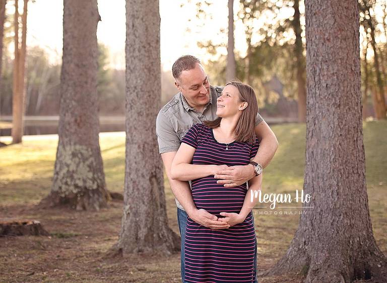beautiful maternity session in southern nh happy couple looking at each other