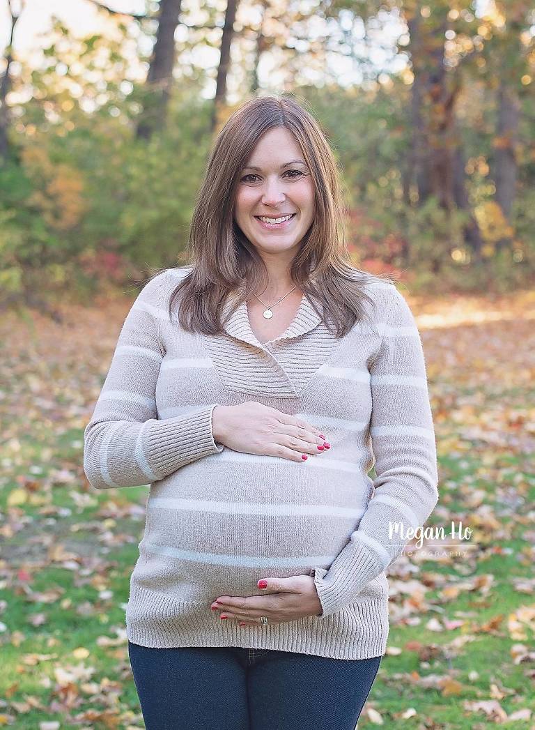 stark park nh fall maternity session mom with hands on belly