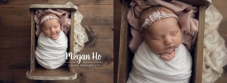 New Hampshire newborn session baby girl wrapped in white and pink sleeping in wood bed