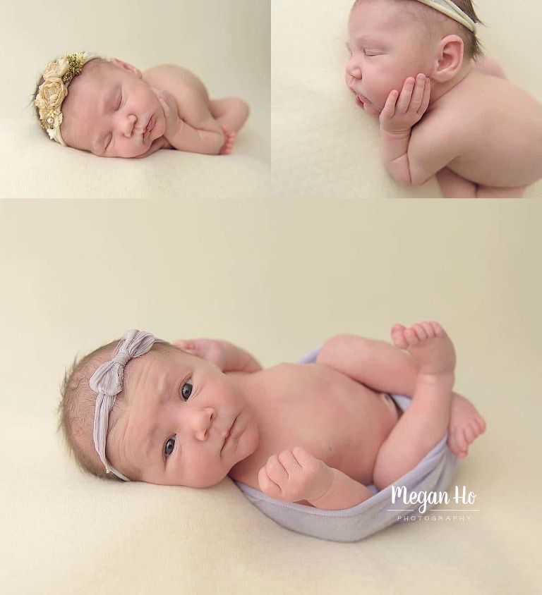 awake baby girl wrapped in purple in nh newborn session