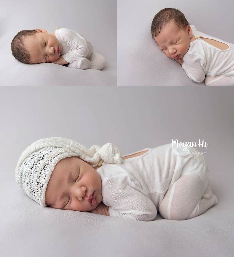 beautiful baby boy in white on the lightest grey backdrop in New Hampshire