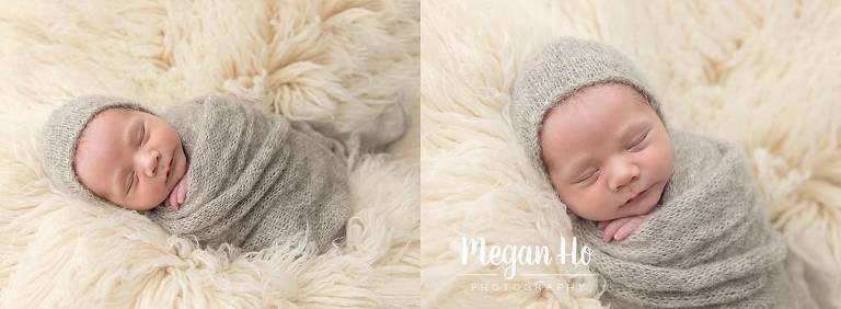 sleeping baby boy all wrapped up in grey on white fluffy blanket in bonnet