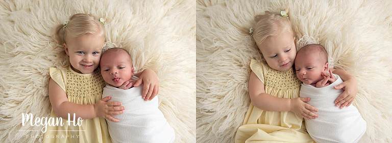 big sister in yellow dress snuggling baby brother