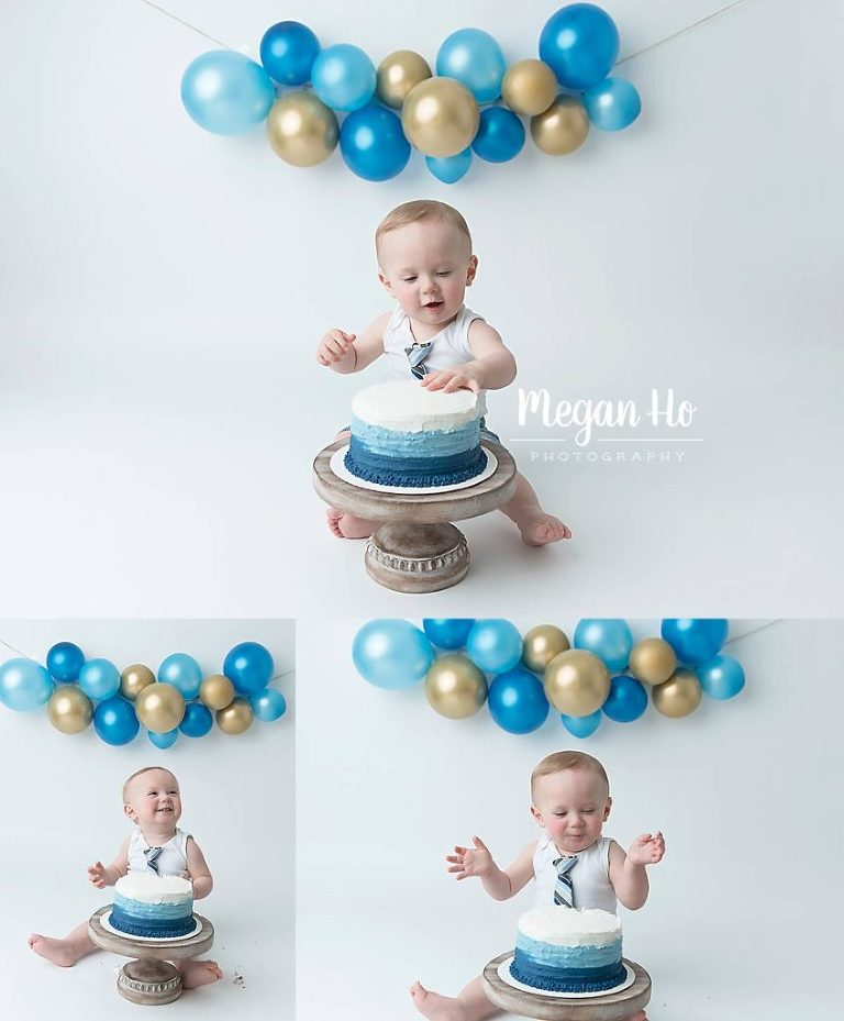 blue and gold cakesmash with little boy in blue tie
