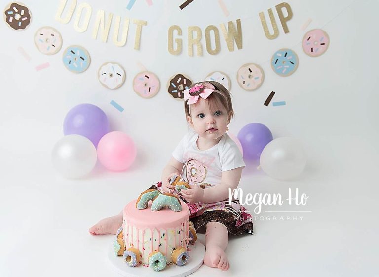sweet little girl in pink and purple donut smash session