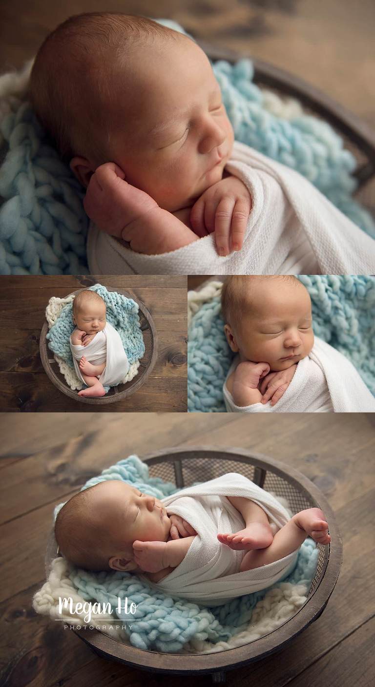 baby boy in white and blue sleeping in little wooden bowl in nh studio